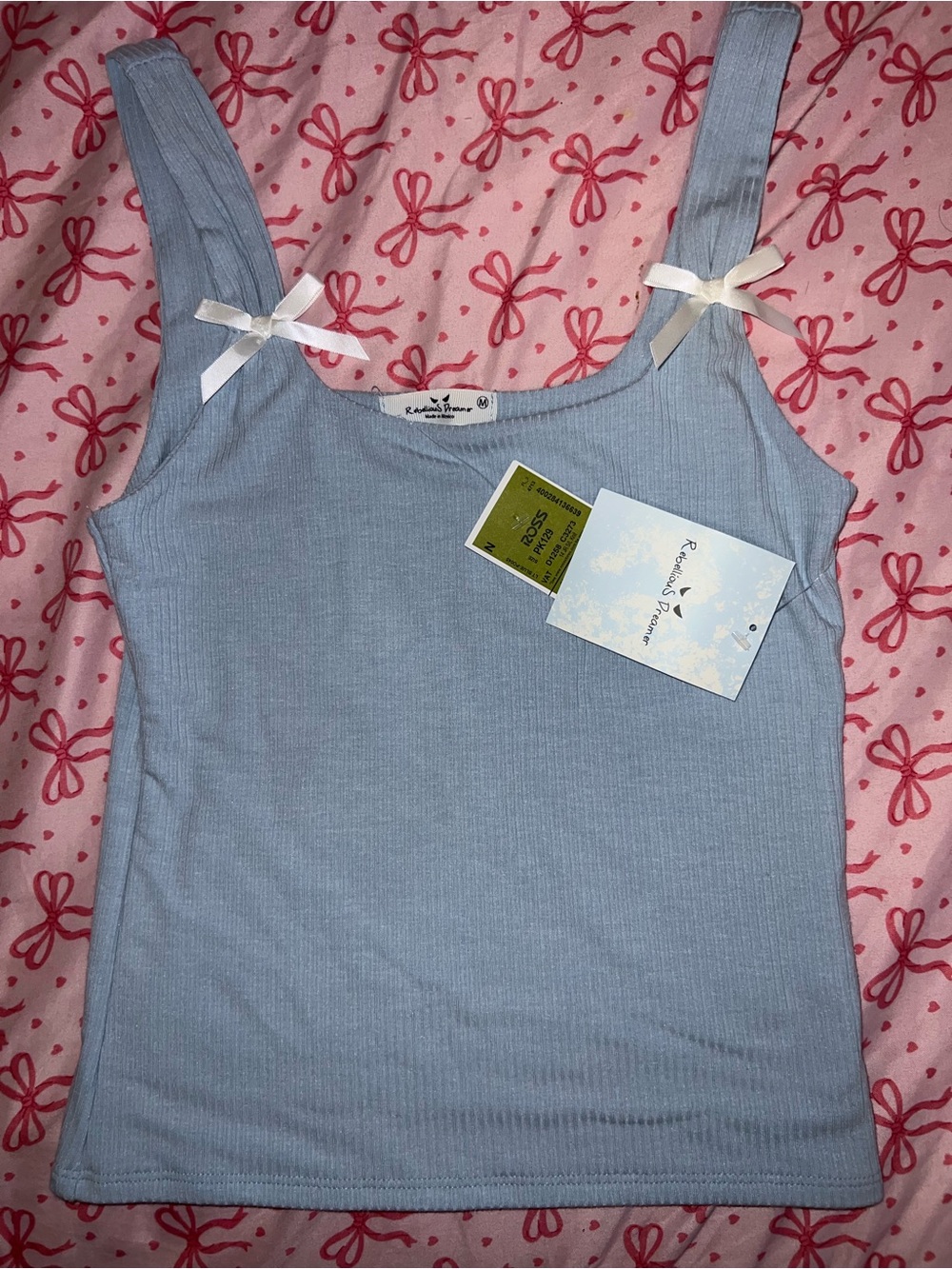 Light blue tank with bows